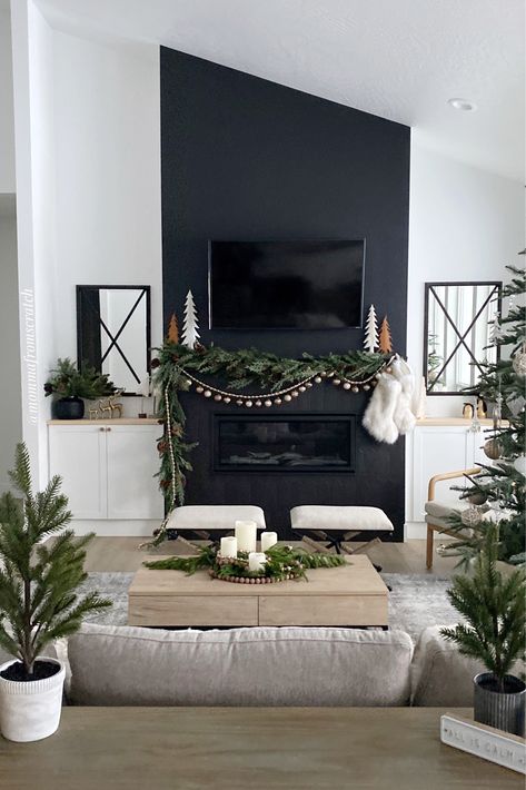 Black Fireplace Wall Christmas, Black Living Room Christmas Decor, Black Living Room Christmas, Fireplace Decor Christmas With Tv, Black Mantel Decor, Black Fireplace Christmas Decorations, Fireplace No Mantle Christmas, Black Mantle Christmas Decor, Black Fireplace Living Room Decor