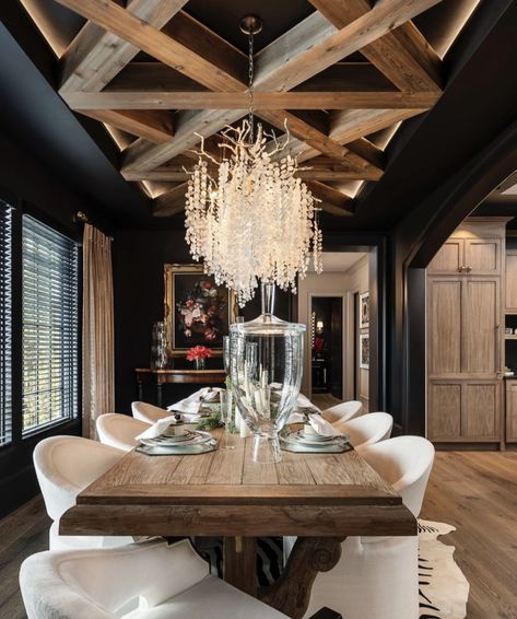 Dining room goals! 😍 This dining room, featuring dark, moody walls and intricate ceiling beams, is ideal for any occasion.⁠ ⁠ Construction | @fairview_custom_homes ⁠ Photography | @inspiro8studios⁠ Dark Gray Dining Room, Dark Grey Dining Room, Renovation Bedroom, Moody Dining Room, Tennessee House, Metal Building House Plans, Dinning Tables, Dream Dining Room, Eat Drink And Be Merry