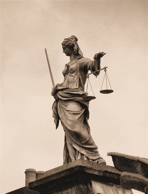 Lady justice usually says the sword in her right hand and the balancing scales in her left. Some are blindfolded, but not all. Lady Justice Statue, Justice Statue, Lady Justice, A Lady, Scales, Statue, Building