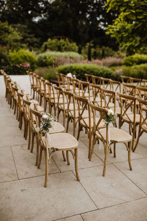 Outdoor seating area for summer wedding with the chairs decorated with pale pink rose chair back decor Seat Decorations Wedding Chairs, Backyard Wedding Chairs, Wedding Chair Deco, Chair Decoration Ideas, Outdoor Wedding Chairs, Wedding Chairs Diy, Wedding Chair Decor, Ceremony Arch Decor, Rose Chair