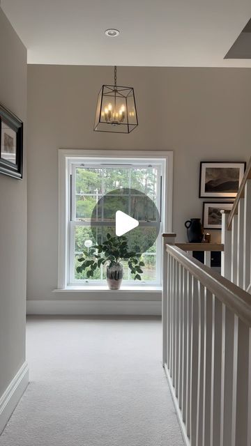 Chloe Dulieu on Instagram: "A moody, rainy last day of February 🩶
I thought I’d capture the upstairs landing & its view today as something about it felt cosy, plus Blue was being all cute 🐾

Walls are painted in Ammonite @farrowandball 
Black console @furniture123uk 
Pendant light @nextofficial 
Mirror @dunelmuk 
Black vase @homesense_uk 
Drip vase @marksandspencer 
Eucalyptus stems @foxandbeau 
Lamp @habitatuk 
Brown candle holders @zarahome 
Wall art @troveprints 
Frames @ikeauk 
Hallway rug @etsy 

#landing #upstairslanding #sashwindows #view #countryside #console #consoletable #consolestyling #candles #february #interiors #accessories #styling #interiorstyling #pendant #pendantlights #lighting #lamp #vase #style #interiordesign #neutrals #farrowandball #ammonite #hallway #renovation" Hallway Styling, Large Landing Ideas Upstairs, Landing Decor Upstairs, Landing Ideas Upstairs, Hall Stairs And Landing Decor, Stairs And Landing Decor, Stairs And Landing Ideas, Brown Candle Holders, Landing Decor