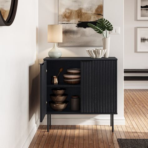 Step into a space where timeless elegance meets modern practicality with the Lysander Compact Sideboard Buffet. Fluted design made of engineered wood paired with metal legs. Small Buffet Cabinet, Chic Wall Art, Buffets And Sideboards, Black Sideboard, Cabinet Bed, Mdf Frame, Buffet Cabinet, Black Cabinets, Dining Accessories