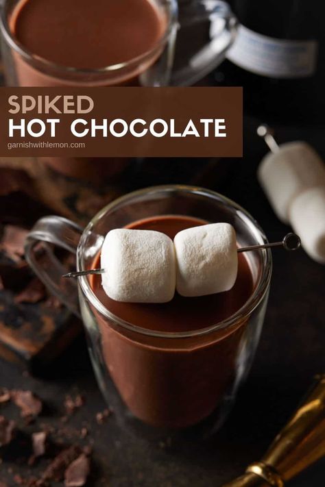 There's no better way to warm up on a chilly night than a mug of this decadent Spiked Hot Chocolate. Smooth, creamy and not too sweet, this hot chocolate with alcohol is better than any powdered cocoa mix and just as easy to make with only six ingredients! Hot Chocolate With Alcohol, Chocolate With Alcohol, Alcoholic Hot Chocolate, Spiked Hot Chocolate Recipe, Spiked Hot Cocoa, Alcohol Chocolate, Batch Cocktail Recipe, Spiked Hot Chocolate, Cocoa Drink