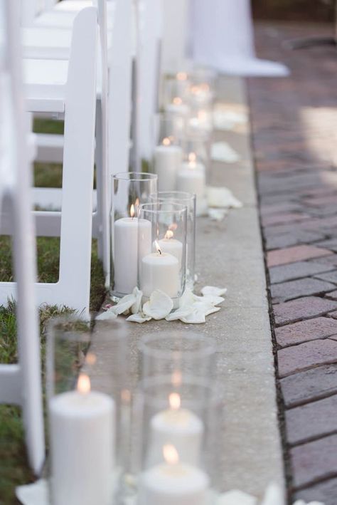 Candles Wedding Ceremony Aisle, Candles Ceremony Aisle, Ceremony Aisle With Candles, White Candles Wedding Table, Wedding Ceremony Simple Decorations, Candles Along Wedding Aisle, Outside Wedding Decorations Ceremony, Wedding Aisle Decorations Indoor Simple, Simple Elegant Wedding Ceremony Decor