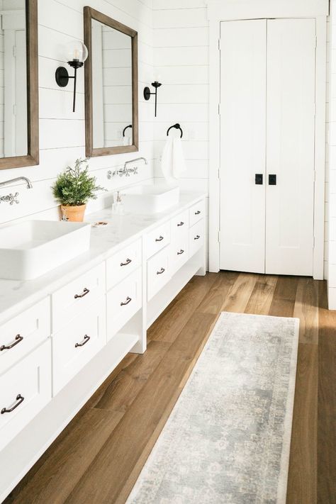 Modern Farmhouse Bathroom White Vanity, Modern Farmhouse Freestanding Tub, Guest Bathroom Modern Farmhouse, Light Wood Floors Bathroom, White Vanity Wood Floor, Master Bath With Lvp Floors, Bathroom Remodel Wood Floor, Lvp Bathroom Floors, Bathrooms With Wood Floors