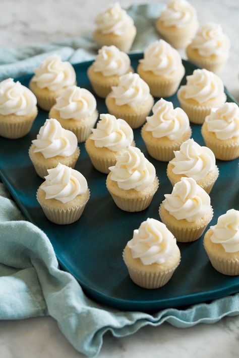 Homemade mini cupcakes that are bite size decadent dessert. Includes a fluffy, tender, sweet vanilla cake with a rich buttercream swirled atop. Mini Cupcake Recipes, Small Batch Cupcakes, Bite Size Cupcakes, Fluffy Cupcakes, Vanilla Cupcake Recipe, Buttercream Cupcakes, Dessert Bites, Mini Muffin Pan, Cooking Classy