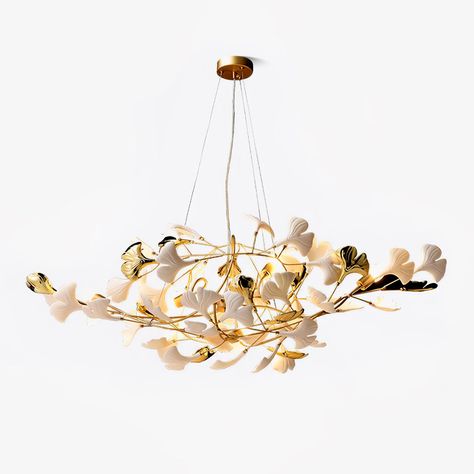 This ceramic ginkgo tree petal chandelier shows its luxurious style in overall design, material, and manufacturing technology. The metal lamp body is covered with exquisite ceramic petals, which reflects the perfect combination of lighting design and natural plants. 
 Gingko Chandeliers are impressive bespoke installations, composed of handcrafted porcelain leaves. The interplay between ceramic and light has the power to create a sense of wellbeing and warm atmosphere. The light sculpture goes m Petal Chandelier, Lampe Metal, Ginkgo Tree, Chandelier Art, C 130, Luxury Chandelier, Gold Ceramic, Light Sculpture, Chandelier Style