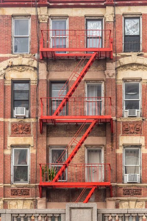 Red fire escape of an apartment building in New York city Apartment Fire Escape, Escape Tattoo, Nyc Fire Escape, New York City Images, Apartment Exterior, Exterior Stairs, Building Front, New York City Apartment, Fire Escape