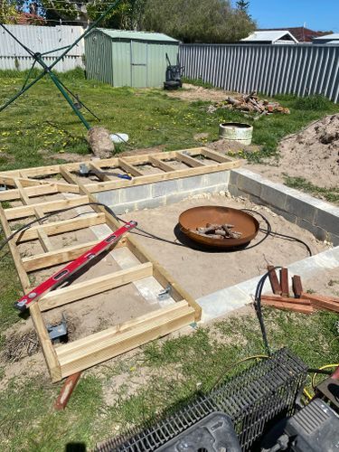 D.I.Y. sunken fire pit with seating | Bunnings Workshop community Cinderblock Fire Pit Diy, Propane Fire Pit Diy, Sunken Fire Pit With Seating, Fire Pit Sunken, Fire Pit With Seating, Sunken Fire Pit, Fire Pit Sphere, Sunken Fire Pits, Conversation Pit