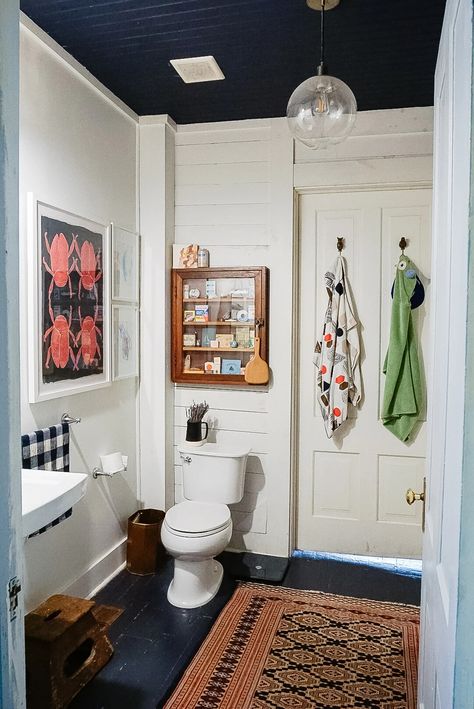 A Colorful, Art-Filled Home in Mississippi | Cup of Jo Cabin Guest Bathroom, Eclectic Boho Bathroom, Guest Bathroom Amenities, Eclectic Half Bathroom, Nesting With Grace Bathroom, Fun Bathroom Design, Small Eclectic Bathroom, Gallery Wall In Bathroom, Bathroom Vintage Ideas