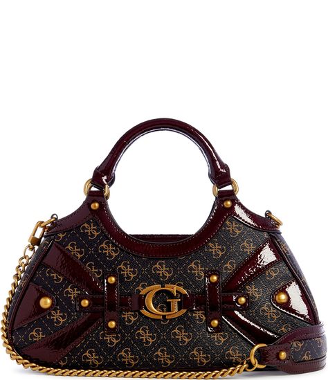 From Guess, the Mintha Brown Logo Satchel Bag features:Trim: Patent PU80% Polyester, 20% Cotton liningAntique bronze hardwareQ logo detailMag snap closureSingle compartmentInterior pockets: 1 zip, 6 credit card slotsExterior details: back zip pocket, feetTop handle: Approx. 4.75" handle dropAdjustable removable crossbody strap: Approx. 22" detach dropApprox. dimensions: 12.5" x 3&#0 Black Owned Designer Handbags, Affordable Purses And Handbags, Classy Gifts For Women, Bags With Outfits, Vintage Luxury Bags, Weird Items, 2000s Purse, Brown Clothes, Cheap Designer Bags