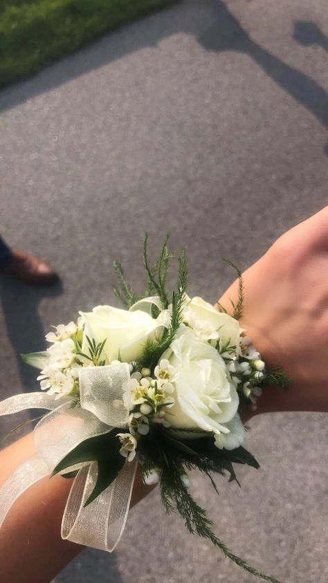 prom wrist corsage of white roses and ribbons Simple White Flower Arrangements, Prom Corsage Ideas, Prom Corsage White, Prom Bouquet Ideas, Elegant Flower Arrangements, Corsage White, Prom Flowers Corsage, Corsage Ideas, White Corsage