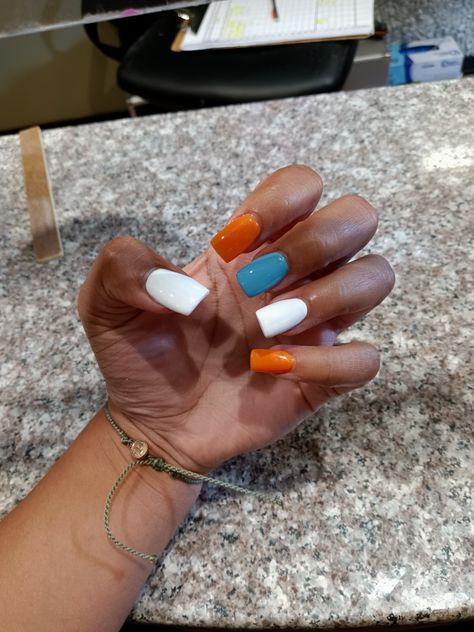 Cute Western Gel Nails, 4 Color Nails, Cute Nails Acrylic Country, Orange And White Fall Nails, Simple Orange And White Nails, White Orange And Blue Nails, Western Color Nails, Western Nails Orange And Teal, How To Do Checkers On Nails