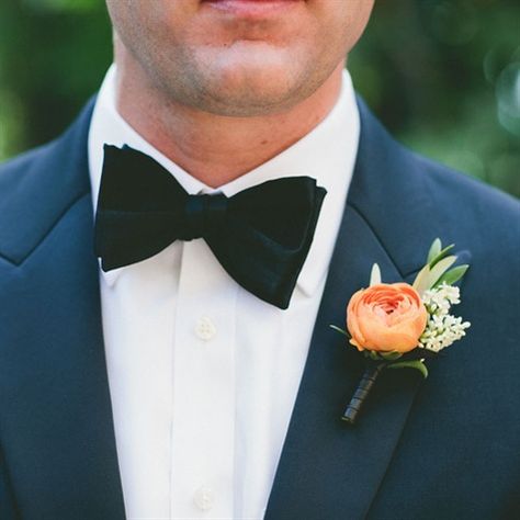 The groom's boutonniere will be an orange ranunculus, pink astilbe and green bay laurel wrapped in navy ribbon with the stems showing. Indian Wells California, Orange Boutonniere, Ranunculus Wedding Bouquet, Ranunculus Boutonniere, Peach Ranunculus, Orange Ranunculus, Navy Ribbon, Groomsmen Boutonniere, Fleur Orange