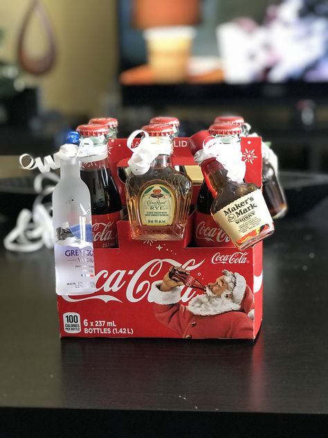 Christmas coke with mini liquor    bottles. Best Gift Baskets, Fun Christmas Games, Diy Gift Baskets, Alcohol Gifts, Basket Gift, Christmas Baskets, Navidad Diy, Christmas Gift Basket, Christmas Gift Baskets