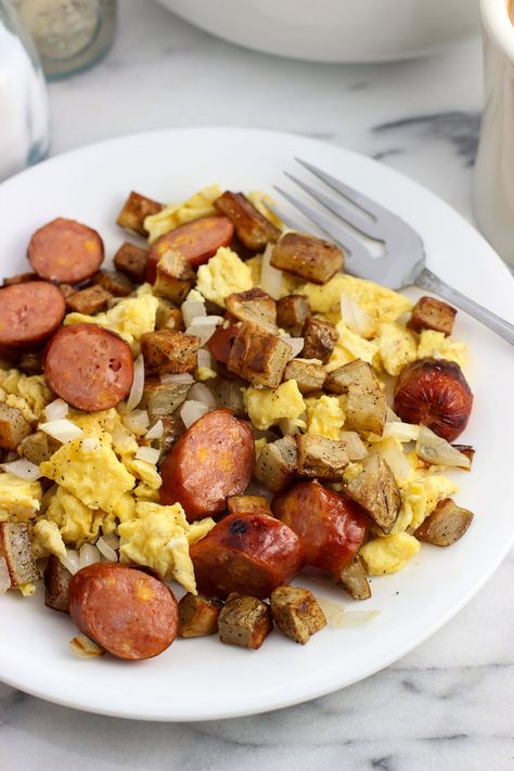 Enjoy breakfast made entirely on the grill with this grilled smoked sausage breakfast egg scramble, featuring eggs, onion, potatoes, and smoked sausages. #GiveLifeMoreFlavor AD Grilled Onion, Breakfast Eggs Scrambled, Breakfast Sausage Links, Egg Scramble, Breakfast Sausage Recipes, Kielbasa Sausage, Sausage Links, Breakfast Meal, Grilled Onions