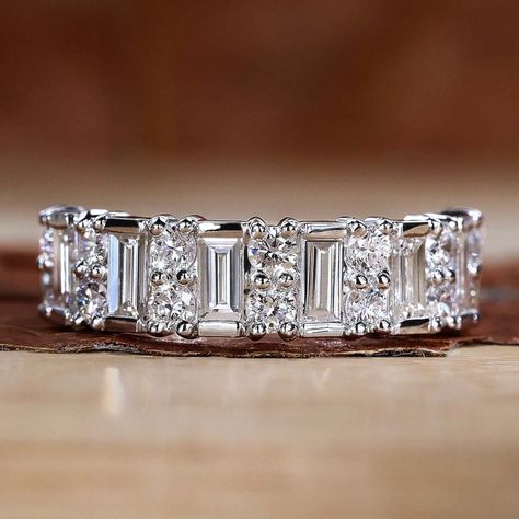 Explore this tradition and modern look with our Baguette and Round Cut Lab Grown Diamond. Select this baguette and round diamond half-eternity wedding band. Emerald Cut Wedding Band, Anniversary Bands For Her, Ethereal Jewelry, Baguette Wedding Band, Round Wedding Band, Stackable Rings Wedding, Cute Engagement Rings, Stackable Wedding Bands, Half Eternity Wedding Band