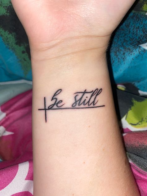 Be Still And Know Tattoo With Cross, Tattoo Be Still And Know, 70x7 Tattoo Design, Be Still Finger Tattoo, Be Still Wrist Tattoo, Bible Wrist Tattoos For Women, Phil 4 13 Tattoo Ideas Women, Because He Lives Tattoo, Be Still Tattoo With Cross