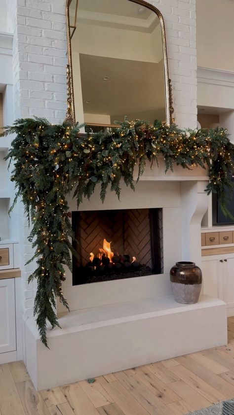 Shop Majestic Holiday Garland and other curated products on LTK, the easiest way to shop everything from your favorite creators. Mantle With Garland And Stocking, Garland Christmas Fireplace, Fireplace Mental Christmas Decor, Christmas Day Decor, Ranch Style House Christmas Lights, Indoor Arch Christmas Decor, Tall Fireplace Christmas Decor, Outside Of House Christmas Decor, Christmas Tree By The Fireplace