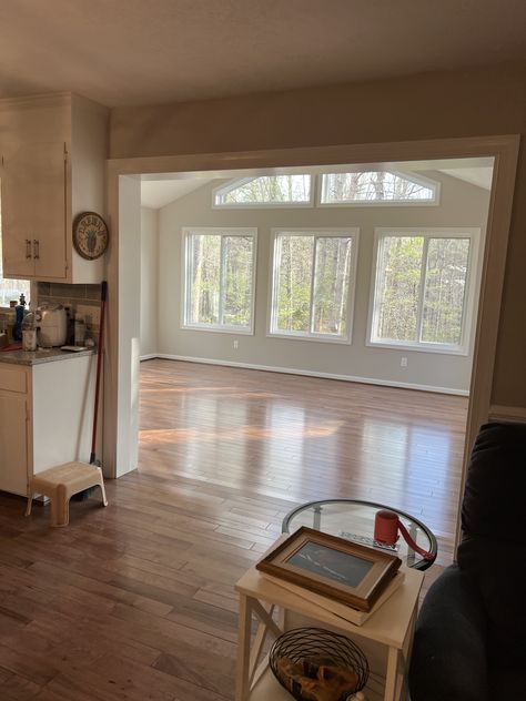 Living Room To Deck Transition, Add On Den To House, Living Room Full Of Windows, Farmhouse Living Room Addition, Sunroom Connected To Living Room, Back Room Addition, Sunroom Off Kitchen Ideas, Converting Porch To Living Space, All Season Sunroom Addition