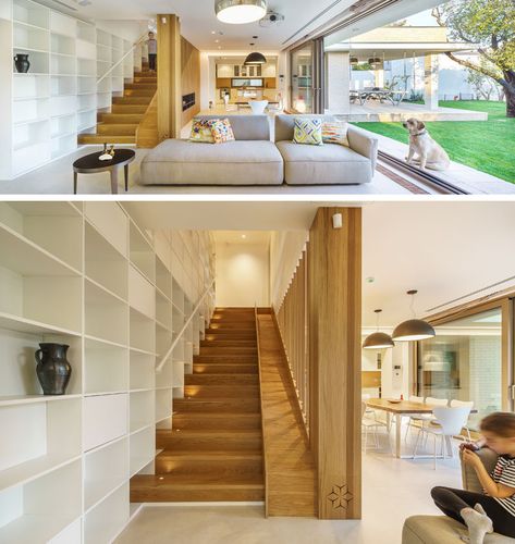 This modern house has wood stairs with a built-in slide for the kids in the family. #WoodStairs #ModernStairs #Slide Slide In The House, Stairs And Slide In House, Stairs With A Slide, Slide Next To Stairs, Built In Slide In House, Slide Inside House, Slide On Stairs, Indoor Slide Stairs, Staircase With Slide