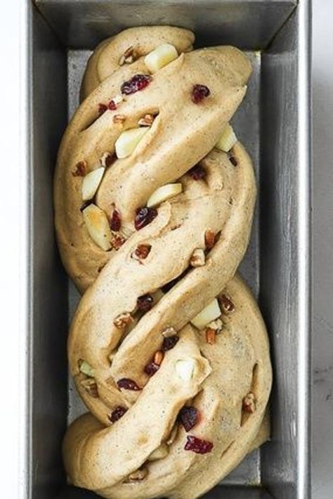 This yeast-raised apple cranberry bread is soft, tender and delicious. It’s slightly sweet, with a bit of crunchy pecans, pieces of dried cranberries and chopped apple throughout, and hints of cinnamon and vanilla. Serve this apple cranberry bread as delicious snack, or side for breakfast and brunch, and even a good base for French toast and bread pudding. | bread recipes homemade | sweet bread recipes homemade | apple cranberry bread recipe | how to make homemade bread | apple cranberry recipes Homemade Apple Bread Recipe, Apple Artisan Bread, Yeast Breads Sweet, Cinnamon Cranberry Bread, Pomegranate Bread Recipes, Cinnamon Wreath Bread, Raising Bread Recipe, Bread Recipes Thanksgiving, Apple Yeast Bread Recipe