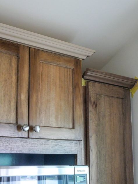 Learn pro tips for creating a faux wood finish that looks just like the real thing. Everything you need to know, from tools to techniques! #fauxwoodfinish #fauxwood #paintedwood #fauxwoodtutorial #diy #diyhome #diywood #diyproject #looklikewood #fakewoodfinish Painting Faux Wood Kitchen Cabinets, How To Paint Faux Wood Cabinets, How To Make Painted Cabinets Look Like Wood, Diy Faux Wood Cabinets, How To Paint A Cabinet To Look Distressed, Paint Cabinet To Look Like Wood, Painting Cabinets To Look Like Wood, How To Paint Cabinets To Look Like Wood, How To Make Mdf Look Like Wood