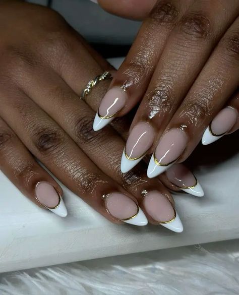 20 Best Fall Nail Colors for Dark Skin Tones 2024: Matte, Bold, and Elegant Ideas Almond French White Nails, Black Tip With Gold Line Nails, Almond French Tip Nails With Gold Line, Black French Tip Nails Almond With Gold, New Years Inspo Nails, Almond French Tip With Gold Line, Gold Line French Tip, White French Tip Nails With Gold Line, French With Line Nails