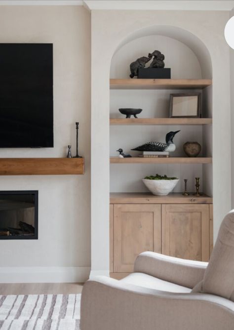 Built In Cabinets Tv Wall, Alternatives To Built Ins By Fireplace, Basement With Bar And Living Room, Diy Shelves Next To Fireplace, Arch Tv Wall Design, Arched Tv Built In, Cabinet Around Fireplace, Basement Built In, Arch Built In