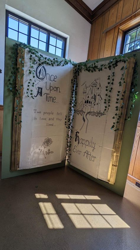 Storybook Graduation Party, Winnie The Pooh Book Backdrop, Fairytale Window Display, Fairy Tale Diy Decor, Fairytale Homecoming Decorations, Story Book Decorating Ideas, Storybook Themed Party, Fairy Tale Room Transformation, Fairy Tale Decorations Party