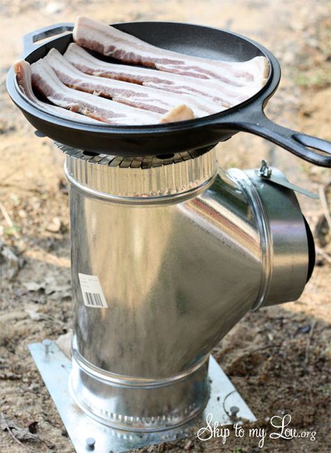 I love this camp stove!!!!!  Great idea!!!~~DIY Camp Stove...We are thinking outside the box and made ourselves a camp stove out of ductwork! Diy Camp Stove, Astuces Camping-car, Camping Bedarf, Camping Diy, Camp Stove, Outdoor Stove, Rocket Stove, Astuces Diy, Rocket Stoves