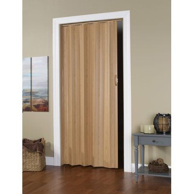 The homestyle accordion door offers value and durability. A cost-effective solution for your storage and privacy needs. Size: 49" x 95", Finish: Oak | Accordion Door - LTL Home Products Flush PVC / Vinyl Homestyle Accordion Door PVC / Vinyl in Brown, Size 49" x 95" | Wayfair Modern Accordion Closet Doors, Accordian Door Laundry Room, No Bathroom Door Solution, Accordian Closet Doors Ideas, Door Options For Small Spaces, Pantry Door Alternatives, Cover Doorway With No Door, Door For Small Bathroom, Accordion Closet Doors