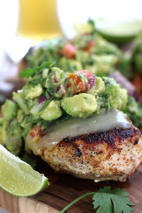 Easy Seared Chicken Guacamole has tender juicy dry rubbed chicken topped with melted Jack cheese and life-changing homemade guacamole. This is one of the best dinners for healthy and fun eating. #GuacamoleChickenMelt #GuacamoleChicken #EasyChickenDinner #LowCarbDinner #ChickenGuacamole #SearedChicken https://www.thefedupfoodie.com Homemade Guacamole Easy, Chicken Guacamole, Chicken Avocado Sandwich, Guacamole Chicken, Avocado Chicken Salad Recipe, Clean Eating Vegetarian, Avocado Chicken, Seared Chicken Breast, Seared Chicken