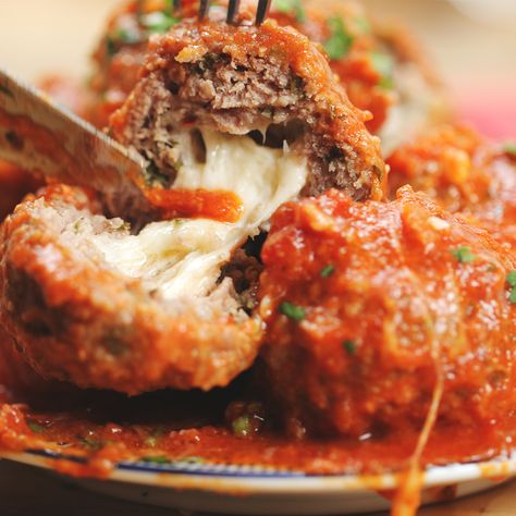 Easy Slow Cooker Mozzarella-Stuffed Meatballs And Sauce Recipe by Tasty Stuffed Meatballs, Mozzarella Stuffed Meatballs, Slow Cooker Meatballs, Crock Pot Recipes, Slow Cooked Meals, Homemade Tomato Sauce, Easy Slow Cooker, Meatball Recipes, Comfort Foods