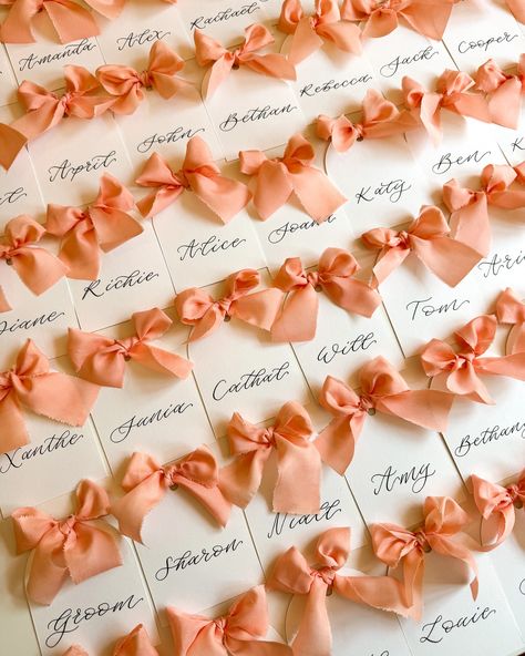 Arched matte place cards with Coral bows 🎀 #weddingplacecards #placecards #weddingcalligraphy #weddingstationery #onthedaystationery #placecardswithbows #weddingplacecardsideas #placecardideas Wedding Place Setting Cards, Place Setting Cards, Name Place Cards, Wedding Place Settings, Wedding Calligraphy, Wedding Place Cards, Wedding Seating, Place Settings, Rehearsal Dinners