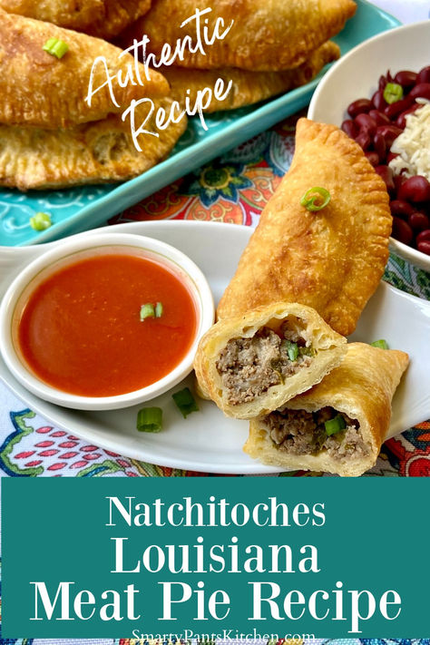 Natchitoches meat pie on plate with Louisiana hot sauce. Cajun Hand Pies, Louisiana Meat Pies, Cajun Meat Pies, Louisiana Meat Pie Recipe, Cajun Entrees, Meat Pies Recipes, Fried Meat Pies, Natchitoches Meat Pie Recipe, Meat Pie Recipes