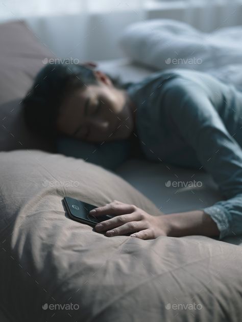 Woman sleeping and holding her phone by stokkete. Woman sleeping in her bed, she fell asleep holding her smartphone, lifestyle and technology concept #Affiliate #phone, #stokkete, #bed, #Woman First Date Rules, Woman Sleeping, Miss You Images, Sleeping Women, Sleeping Too Much, Alone Photography, Girl Sleeping, Fell Asleep, When You Sleep