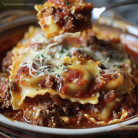 This Crockpot Ravioli Lasagna is a hearty and easy-to-make dish. Layered with cheese ravioli, ground beef, and rich pasta sauce, it's perfect for a satisfying family dinner. Easy Crockpot Ravioli Lasagna Recipe, Crockpot Cheese Ravioli Recipe, Lasagna Soup With Ravioli, Lasagna Soup Recipe Crockpot Ground Beef, Crockpot Ravioli Lasagna Crock Pot, Ravioli In The Crockpot, Ravioli Lasagna Soup, Easy Crockpot Ravioli Lasagna, Ravioli Recipe Crockpot