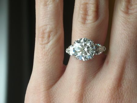 round solitaire with pear shaped side diamonds. Round Diamond With Side Stones, Ups Truck, Ring Goals, Dig Jewelry, Leon Mege, Cumberland Island, Future Planning, Diamond Jewelry Earrings, Cute Engagement Rings