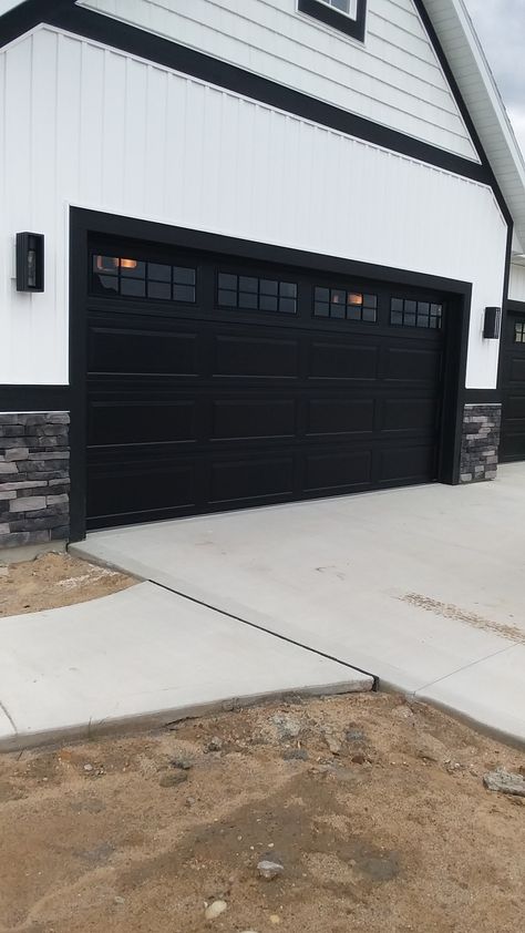 Dark Gray House Exterior Black Garage Doors, Black Double Garage Doors, Exterior House Colors With Black Garage Doors, Tan Siding Black Garage Door, White Siding Black Garage Door, Double Garage Door Ideas Modern, 2 Car Garage Doors, Matte Black Garage Door, Cream House Black Garage Door