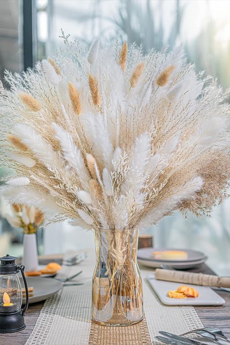 Check out some ideas on which pampas grass you could use for your baby shower decorations with the theme of elegance, white, gold and boho vibes. 

#babyshower #elegantbabyshower #mommy-to-be #BabyShowerMagic #GenderNeutralLove #BohoVibes  #whiteandgolden #babygirl #babyboy #endlesslove
#pampasgrass #bohodecoration #babyshowerdecoration #diydecoration Grass Centerpiece, Wedding Decor Rustic, Table Decor Wedding, Pampas Grass Bouquet, Dried Pampas, Pampas Grass Decor, Grass Decor, Centerpiece Table, Floral Arrangements Wedding