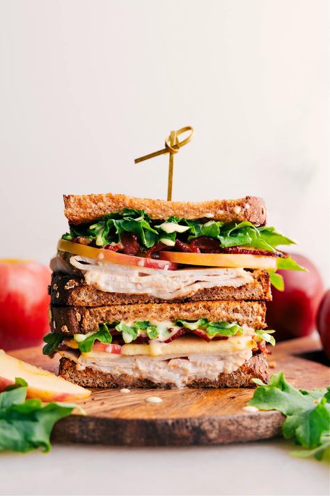 This Turkey Sandwich packs a punch with creamy avocado, tangy cheese, a crispy sweet potato hash brown, and garlic-mayo Best Turkey Sandwich, November Meals, Goat Cheese Sandwich, Tasty Sandwiches, Sweet Potato Hash Browns, Turkey Sandwiches Recipes, Apple Coleslaw, Sweet Potato Patties, Lunch Foods