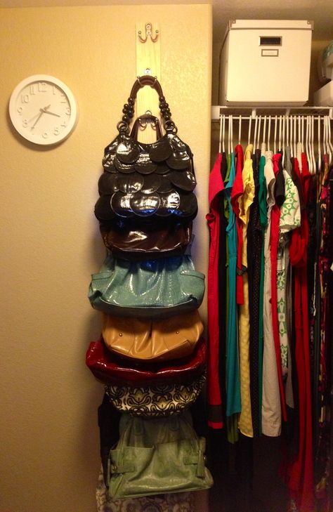 Purse Rack DIY.  Buy a long, wood board.  Screw hooks on sideways.  Easy, organized, bag storage. Purse Rack, Organiser Son Dressing, Organization Hacks Bedroom, Purse Storage, Understairs Storage, Purse Organization, Master Closet, Closet Space, Closet Bedroom