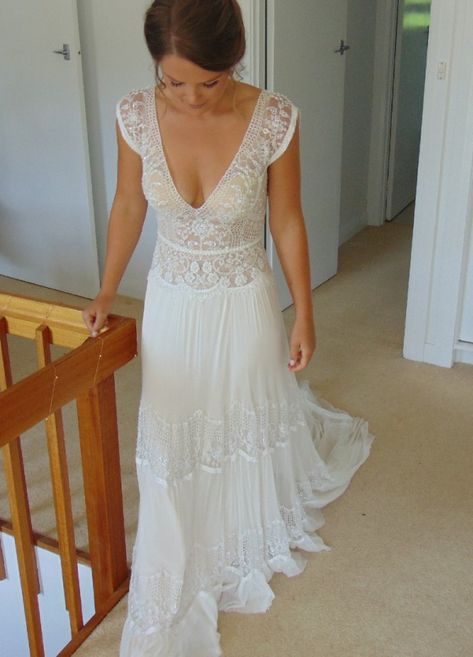 Here is a cap sleeve #bridal dress with a deep V-neck line.  Custom #weddingdresses like this do not have to be costly.  We can recreate designer #dresses for #brides in a budget they can afford.  #women can also request #replicas of #hautecouture #weddinggowns from our USA dress design firm.  Our version will have the same over all #style but cost way less than a #couture original.  Email us at #dariuscordell for more info. Wedding Dress For Short Waisted Women, Small Waist Wedding Dress, Wedding Dresses Older Brides Over 40, Simple Boho Wedding Dress Bohemian, Wedding Dress With No Train, Cap Sleeve Wedding Dress, Designer Dresses Couture, Usa Dress, Wedding Dress Cap Sleeves