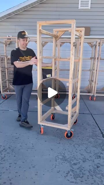 Alex Hansen on Instagram: "Just another day cranking out shelving unit for those wanting to make carrying around hefty bins easier.   @giving_angelsut reached out because they wanted to find a solution for there trailer. They had tons of bins and bags of clothing for their charity and they needed a way to keep everything organized.  Stay tuned for the before and after.   #storage #storagebins #storagesolutions #storageideas #storagewars #garageorganization #garagegoals #storagebins #storagetote #storagerack #utah #reels #reelsinstagram #cleaningmotivation #organization #trending #youtube #lovewhatyoudo #utahgram #trendystoragesolutions #realtors #utahrealestate" Build Storage Shelves, Storage Shelves On Wheels, 1 Car Garage Storage Ideas, Saw Horse Storage Ideas, Garage Storage On Wheels, Diy Storage Bin Rack, Organize Workshop, Tote Storage Rack, Tote Holder Garage