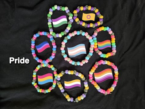 Kandi style bracelets for different pride flags <3  different sizes Matching Bracelets For 6 Friends, Kandi Bracelets No Words, Normal Bead Bracelet Ideas, Pride Pony Bead Bracelets, Easy Kandi Bracelets, Lesbian Kandi Bracelet, Bracelet Ideas Big Beads, Trans Kandi Cuff, Pride Bracelet Ideas