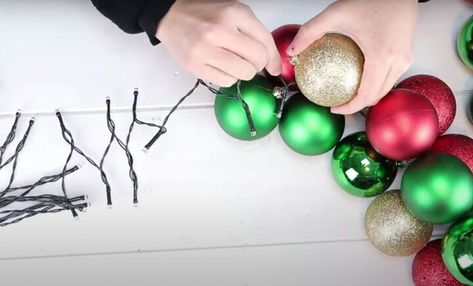 Diy Ornament Garland Christmas Balls, Diy Ornament Garland, Ornament Garland Diy, Diy Christmas Bulbs, Diy Christmas Ball, How To Make Garland, Christmas Lights Garland, Dollar Store Christmas Crafts, Diy Christmas Garland