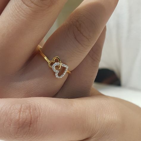 We put our hearts and souls into creating jewelry that will resonate with your spirit. Beautiful jewelry enhances the beauty of your soul. Add a touch of luxury to your life with our exquisite gold jewellery collection. Because you are worth it! 💛 Beautiful 14k Gold & diamond ring with GIA certified diamonds❤️ To order, DM us on Instagram or WhatsApp at 7339756707. Payment modes - Bank transfer, Paypal, Paytm, GPay, UPI, Cards, COD #instalike #instagram #reels#jewellery #jewellerylover ... Diamond Rings Heart, Gold Fancy Rings, Gold Ring Collection, Beautiful Ring Designs, Heart Ring Design, Gold Jewellery Collection, Dimond Ring, Fancy Diamond Ring, Engagement Rings Couple