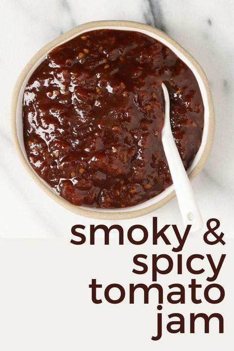 Smoky, Spicy, Tangy and just a little bit sweet, this Tomao Jam will be your favorite accompaniment to many things...your next cheese and cracker board, your next pizza, your next sandwich, and so many more. Recipe and instructions to water bath can. https://nourishandnestle.com/smoky-spiced-tomato-jam-recipe/ Spicy Tomato Jam Recipe Canning, Chutney Canning Recipes, Smoked Tomato Jam, Tomato Chilli Jam Recipe, Tomato Jalapeno Jam, Cowboy Tomato Jam, Tomato Jam Recipes, Savory Tomato Jam, Spicy Tomato Jam