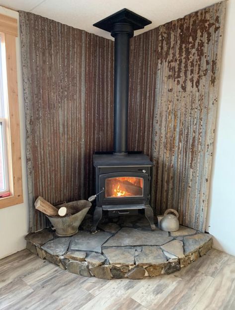 Corner Wood Stove Living Room Layout, Wood Stove Wall Brick, Woodstove Backdrop Ideas, Wood Burning Stove Tall Ceiling, Galvanized Metal Wall Behind Wood Stove, Wood Stove In Shop, Wood Burning Stove Screened Porch, Wood Burning Stove Floor Ideas, Wood Burn Stove Living Room